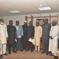 Group photograph of MD, NRC, Railway property and joint committee on land transport during a visit to NRC